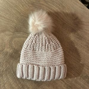 Pom Pom Winter hat, snuggly warm, soft inside hat.